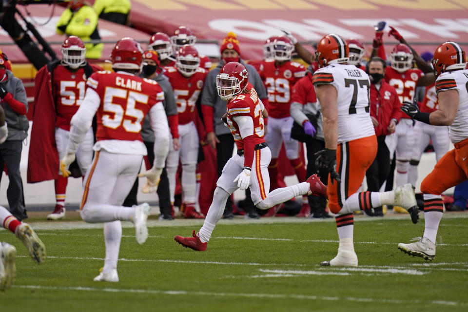 Kansas City Chiefs safety Tyrann Mathieu (32) returns an interception during the second half of an NFL divisional round football game against the Cleveland Browns, Sunday, Jan. 17, 2021, in Kansas City. (AP Photo/Jeff Roberson)