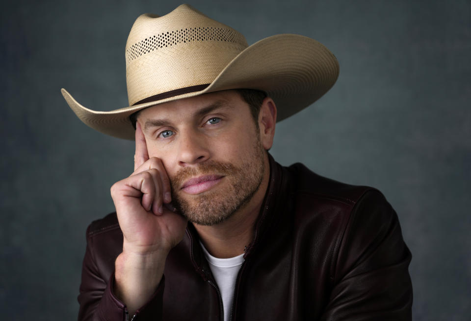 Singer/songwriter Dustin Lynch poses for a portrait, Wednesday, Sept. 20, 2023, in Los Angeles, to promote his latest album "Killed the Cowboy." (AP Photo/Chris Pizzello)