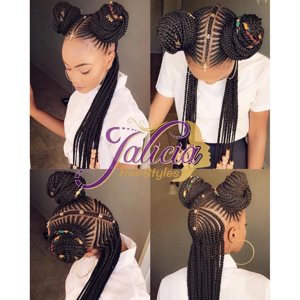 This set of braids is giving us '90s, Ethiopian, and Fulani vibes all at once. We love the way they're styled here with two space buns in the front and hanging braids in the back. The accessories just take the look to the next level.