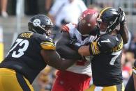 Sep 16, 2018; Pittsburgh, PA, USA; Kansas City Chiefs defensive end Allen Bailey (C) beats Pittsburgh Steelers offensive guard Ramon Foster (73) for a sack of quarterback Ben Roethlisberger (7) during the fourth quarter at Heinz Field. Kansas City won 42-37. Mandatory Credit: Charles LeClaire-USA TODAY Sports