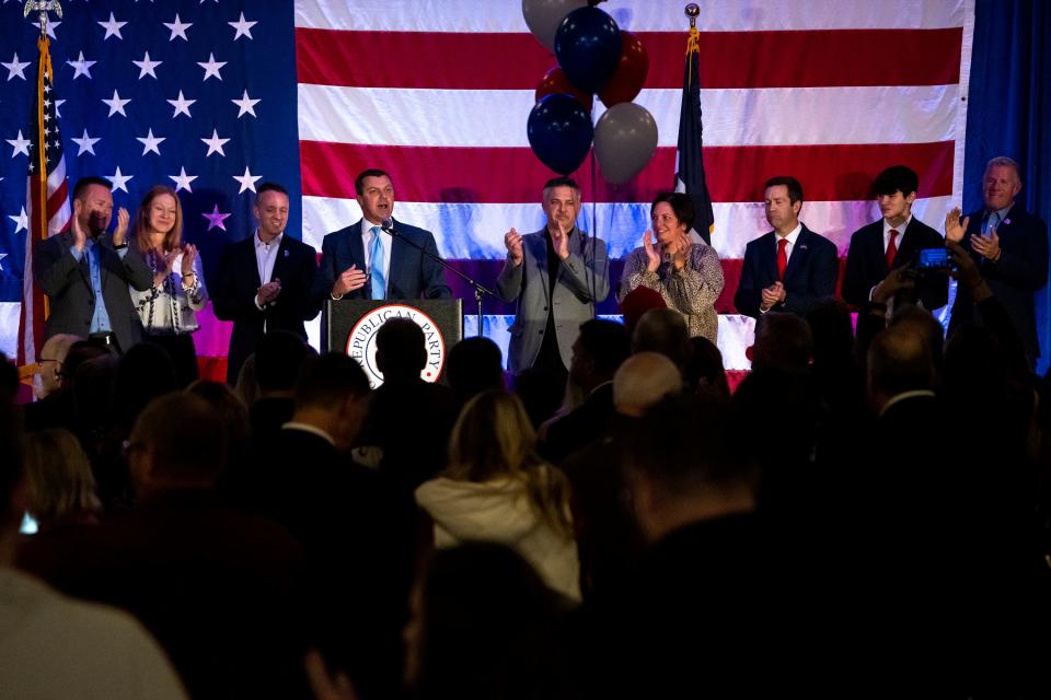 Iowa Senate Majority Leader Jack Whitver, R-Des Moines, surrounded by other members of Iowa's Republican delegation, speaks to the crowd during the Iowa GOP election night celebration, on Tuesday, Nov. 8, 2022, at the Hilton Des Moines Downtown.