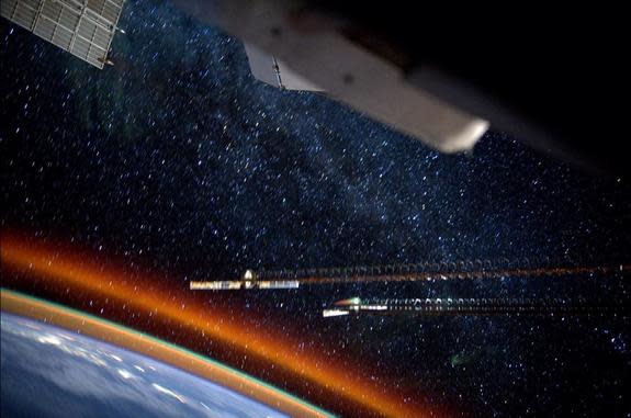 Stars shine above Earth in this amazing time-lapse photo from NASA astronaut Reid Wiseman. It was taken from the International Space Station.