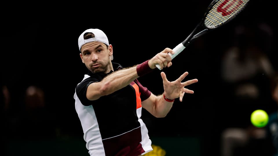 Dimitrov plays a forehand during his win against Medvedev. - Antonio Borga/Eurasia Sport Images/Getty Images