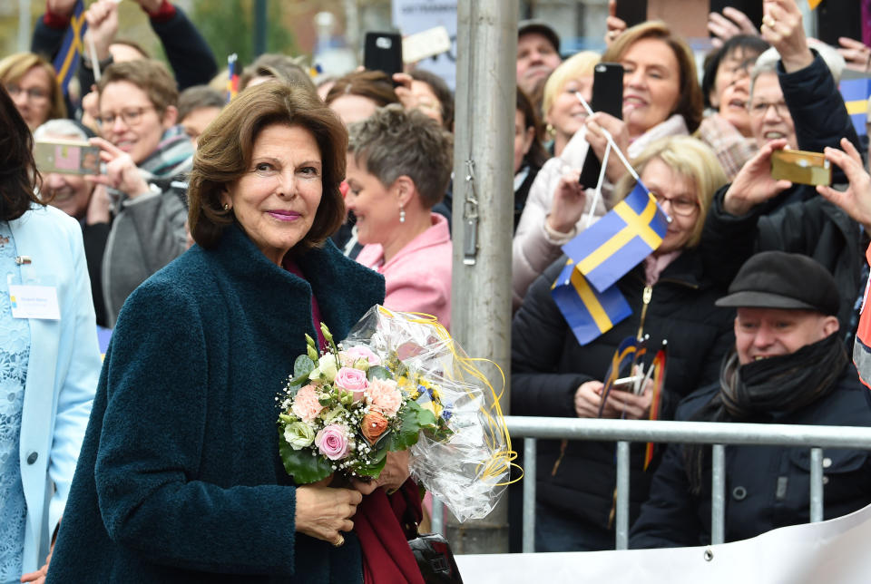 Queen Silvia of Sweden (L) greets wellwishers as she arrives at the St Anna's Abbey to attend the ceremony of the Queen Silvia Nursing Awards in Kroge, Germany on April 3, 2019. (Photo by Carmen Jaspersen / dpa / AFP) / Germany OUT        (Photo credit should read CARMEN JASPERSEN/AFP/Getty Images)
