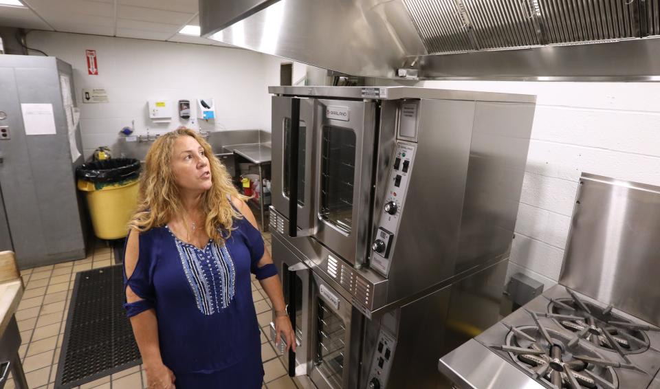 Principal Patricia Smith shows new kitchen equipment in the cafeteria at Grandview Elementary School in Monsey Sept. 5, 2023.