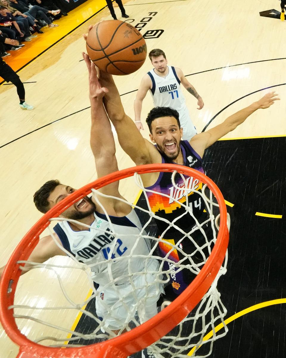 May 10, 2022; Phoenix, Arizona, USA; Dallas Mavericks forward Maxi Kleber (42) challenges the shot by Phoenix Suns guard Landry Shamet (14) during game five of the second round for the 2022 NBA playoffs at Footprint Center.