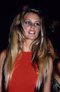 The original woman in red, looking very Brigitte Bardot-esque with her blonde, voluminous hair and sexy, smoky eyes.