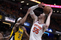 New York Knicks center Isaiah Hartenstein (55) shoots over Indiana Pacers forward Isaiah Jackson (22) during the first half of Game 6 in an NBA basketball second-round playoff series, Friday, May 17, 2024, in Indianapolis. (AP Photo/Michael Conroy)