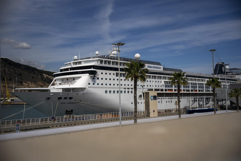 A view of the cruise ship MSC Armony moored in the port of Barcelona, Spain, Wednesday, April 3, 2024. Authorities said Wednesday that a group of 69 Bolivians are not being allowed to disembark from a cruise ship in the Spanish northeastern port of Barcelona because they lack valid documents to enter the European Union's Schengen area. (AP Photo/Emilio Morenatti)