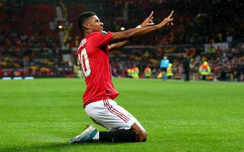 Marcus Rashford of Manchester United celebrates after scoring his team's third goal during the UEFA Europa League group L match between Manchester United and Partizan - Credit: GETTY IMAGES