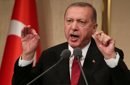 FILE PHOTO: Turkish President Tayyip Erdogan makes a speech during a ceremony marking the second anniversary of the attempted coup at the Presidential Palace in Ankara, Turkey, July 15, 2018. REUTERS/Umit Bektas