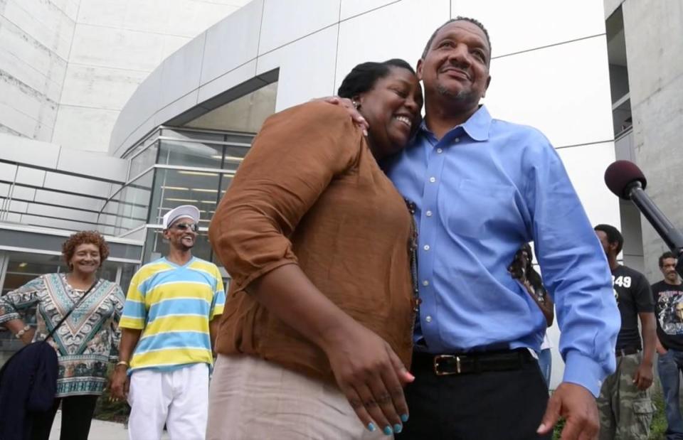 Darryl Anthony Howard, gets a hug from his wife Nannie Howard after he was released from the Durham County Detention Center following Judge Orlando Hudson’s ruling that he was to receive a new trial after a DNA hearing in Durham, N.C. Wednesday , August 31, 2016. Howard attending a hearing seeking relief from two murder verdicts against him Howard, 54, was convicted in 1995 of two counts of second-degree murder for the homicides of Doris Washington, 29, and her 13-year-old daughter, Nishonda, at a Durham public housing complex. The killings occurred in 1991 in what investigators described as revenge for a drug deal gone bad. The Durham DA’s office said they would not appeal the decision.