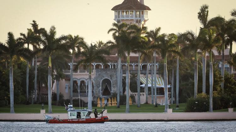 A U.S. Coast Guard boat patrols the Intracoastal Waterway just after sunrise during President-elect Donald Trump?s stay at Mar-a-Lago in Palm Beach Friday, November 25, 2016.