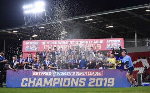 Leeds Rhinos players celebrate after they win the Betfred Womens Supper League - Credit: Getty Images