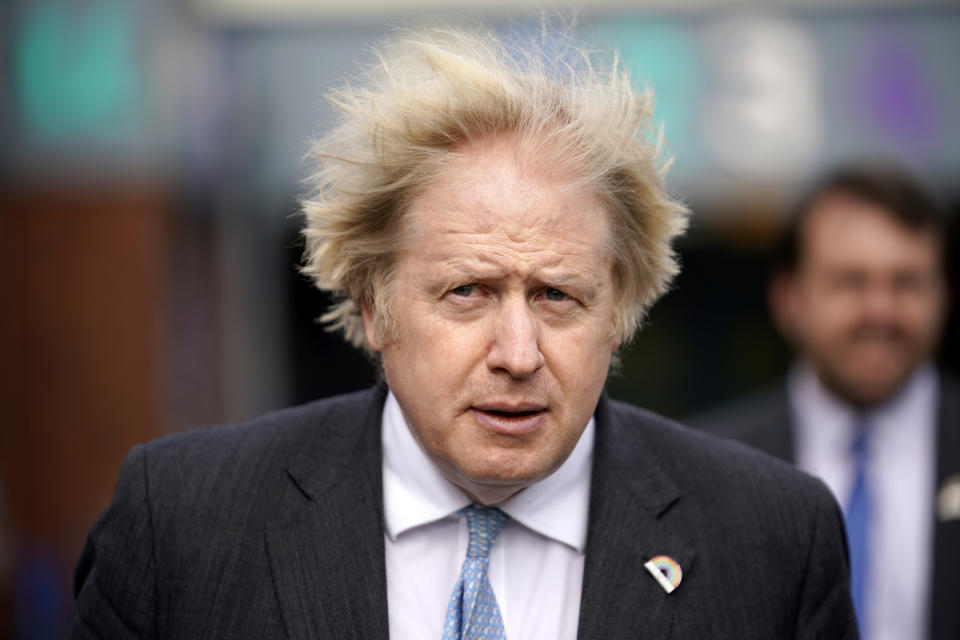 Britain's Prime Minister Boris Johnson reacts during a visit to St Mary's C.E. Primary School in Stoke-on-Trent, central England on March 1, 2021, to see how their preparations are going ahead of students returning on March 8, after England's third lockdown. - Schools are due to reopen to pupils from March 8 as the government gradually relaxes stay-at-home restrictions that have forced lessons to move online. (Photo by Christopher Furlong / POOL / AFP) (Photo by CHRISTOPHER FURLONG/POOL/AFP via Getty Images)