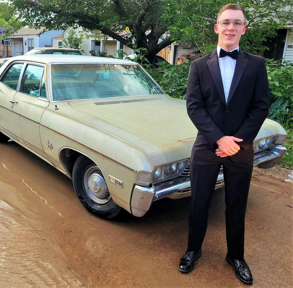 Duncan Lucas, about to get mud on his shiny black shoes next to his classic ride. The ATEMS senior has enjoyed acquiring old cars and working on them. He plans to take this one to College Station, where he will be attending Texas A&M University.