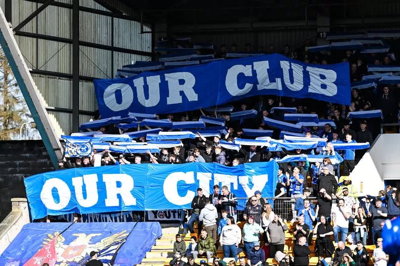 St Johnstone fans display a tifo which reads 'Out Club, Our City' during a cinch Premiership match -Credit:SNS Group