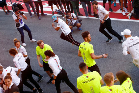 Formula One F1 - Spanish Grand Prix - Circuit de Barcelona-Catalunya, Barcelona, Spain - May 12, 2019 Mercedes' Lewis Hamilton celebrates with his team after victory REUTERS/Juan Medina