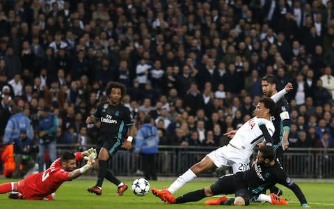 Alli slotted home Spurs' first - Credit: AFP