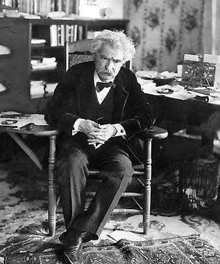 In this undated photo, author Mark Twain, born Samuel Clemens, is shown. “Adventures of Huckleberry Finn” is a frequent target of book bans.