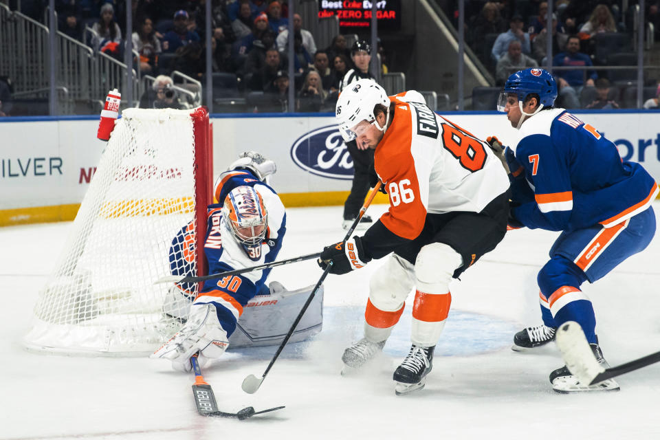 New York Islanders goaltender Ilya Sorokin (30) makes a save on Philadelphia Flyers left wing Joel Farabee (86) during the first period of an NHL hockey game Saturday, Nov. 25, 2023, in Elmont, N.Y. (AP Photo/Eduardo Munoz Alvarez)