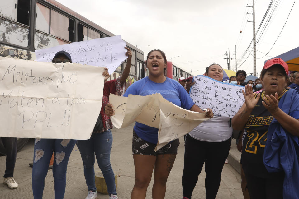 FILE - The relatives of inmates protest for information on the status of inmates after deadly clashes, at the Litoral Penitentiary in Guayaquil, Ecuador, July 25, 2023. (AP Photo/Cesar Muñoz, File)