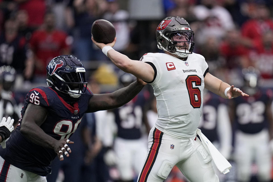 Tampa Bay Buccaneers quarterback Baker Mayfield (6) attempts a pass as Houston Texans defensive tackle Maliek Collins (96) applies pressure during the second half of an NFL football game, Sunday, Nov. 5, 2023, in Houston. (AP Photo/Eric Gay)