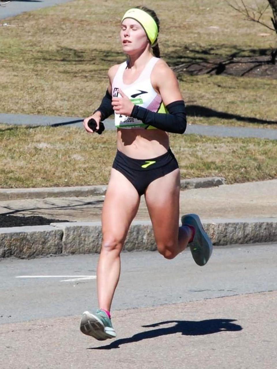 Jessie Cardin of Sutton kicks up an impressive stretch run toward a second-place women's finish at the New Bedford Half Marathon last month.