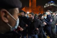 People attend an opposition rally in Yerevan