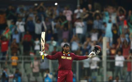 Cricket - West Indies v England - World Twenty20 cricket tournament - Mumbai, India, 16/03/2016. West Indies Chris Gayle celebrates scoring his century. REUTERS/Danish Siddiqui