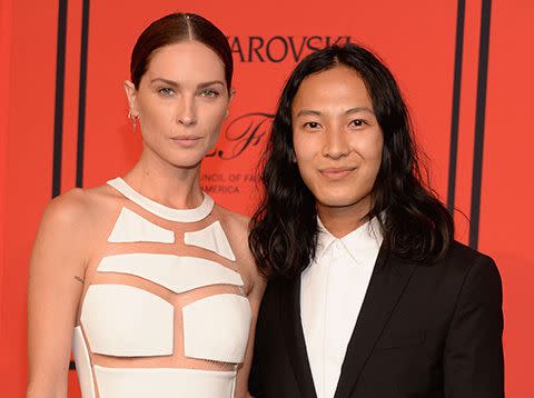 Designer Alexander Wang poses with model Erin Wasson at the CFDA Awards.