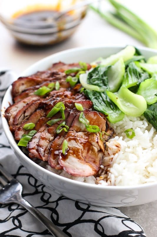 <p>Sweet and salty glazed fire-roasted slices of Chinese barbecue pork and baby bok choy served with fragrant steamed jasmine rice.</p><p><strong>Get the recipe: <a href="https://www.joyousapron.com/chinese-barbecue-pork-char-siu-and-bok-choy-rice-bowl/" rel="nofollow noopener" target="_blank" data-ylk="slk:Chinese Barbecue Pork Char Siu and Bok Choy Rice Bowl;elm:context_link;itc:0;sec:content-canvas" class="link "><em>Chinese Barbecue Pork Char Siu and Bok Choy Rice Bowl</em></a></strong></p>