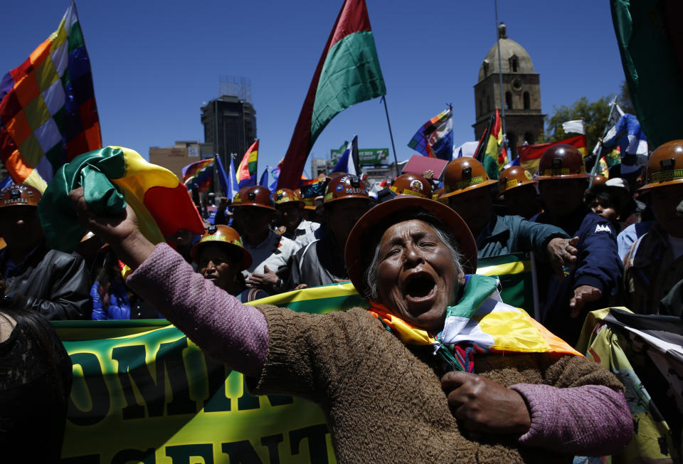 A female supporter of Bolivian President Evo Morales shows her support during a march in La Paz, Bolivia, Wednesday, Oct. 23, 2019. Morales said Wednesday his opponents are trying to stage a coup against him as protests grow over a disputed election he claims he won outright, though a nearly finished vote count suggests it might head to a second round. (AP Photo/Juan Karita)