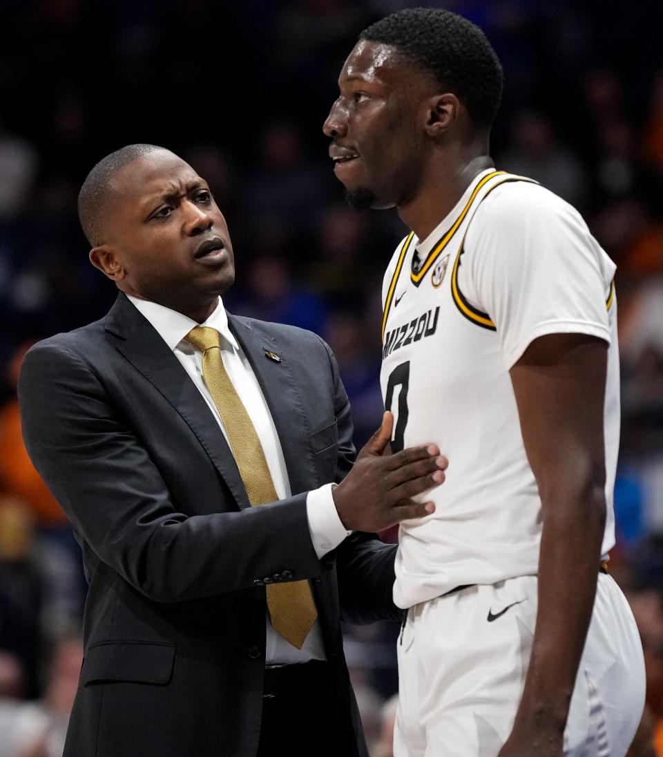 Missouri head coach Dennis Gates works with forward Mohamed Diarra (0) during the first half of a SEC Men’s Basketball Tournament quarterfinal game against the Tennessee at Bridgestone Arena in Nashville, Tenn., Friday, March 10, 2023.