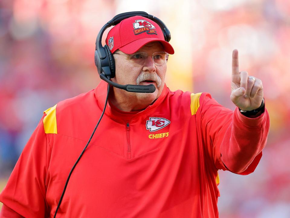 Head coach Andy Reid of the Kansas City Chiefs calls a play during the first half against the Buffalo Bills at Arrowhead Stadium on October 16, 2022 in Kansas City, Missouri