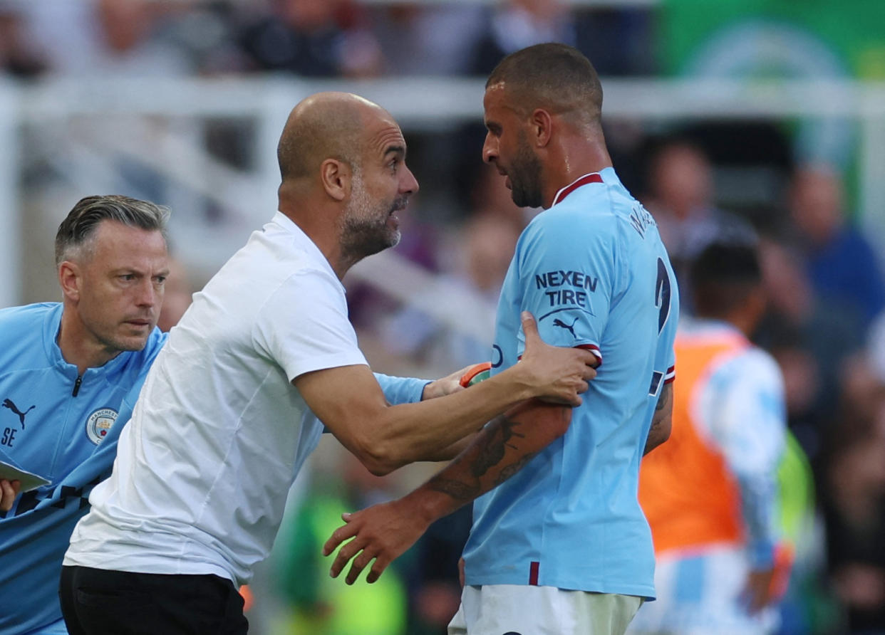 Soccer Football - Premier LeagManchester City manager Pep Guardiola talks animately to Kyle Walker during their Premier League match against Newcastle.ue - Newcastle United v Manchester City - St James' Park, Newcastle, Britain - August 21, 2022 Manchester City manager Pep Guardiola talks to Kyle Walker Action Images via Reuters/Lee Smith EDITORIAL USE ONLY. No use with unauthorized audio, video, data, fixture lists, club/league logos or 'live' services. Online in-match use limited to 75 images, no video emulation. No use in betting, games or single club /league/player publications.  Please contact your account representative for further details.