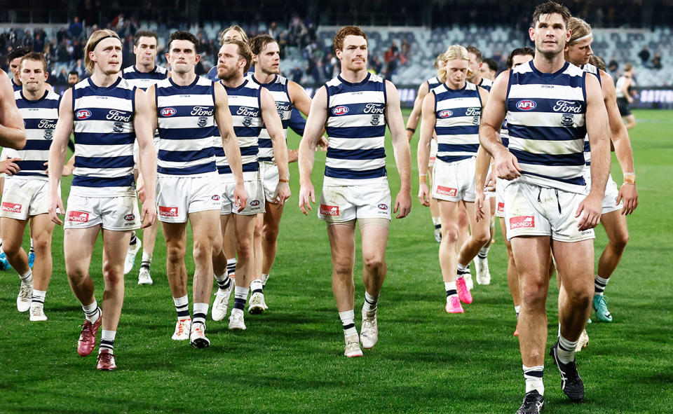 Tom Hawkins, pictured here with teammates after Geelong's loss to Port Adelaide.