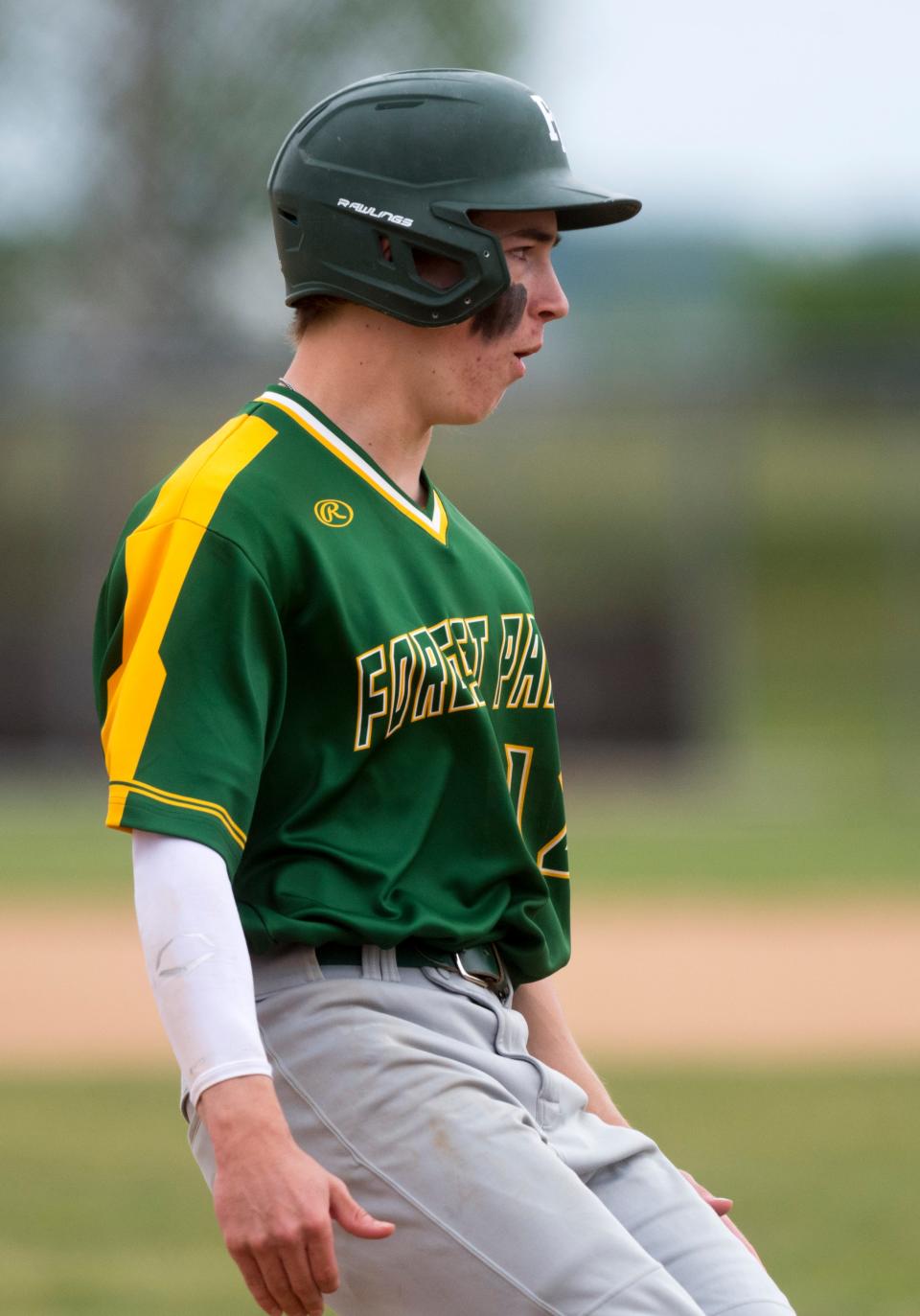Forest Park’s Drew Howard (12) stops at third as the Forest Park Rangers take on the North Posey Vikings Tuesday evening, May 11, 2021. 
