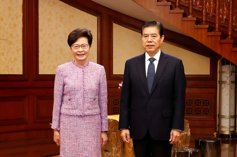 Hong Kong's Chief Executive Carrie Lam meets Chinese Commerce Minister Zhong Shan in Beijing, China in this handout picture released by Hong Kong Information Services Department