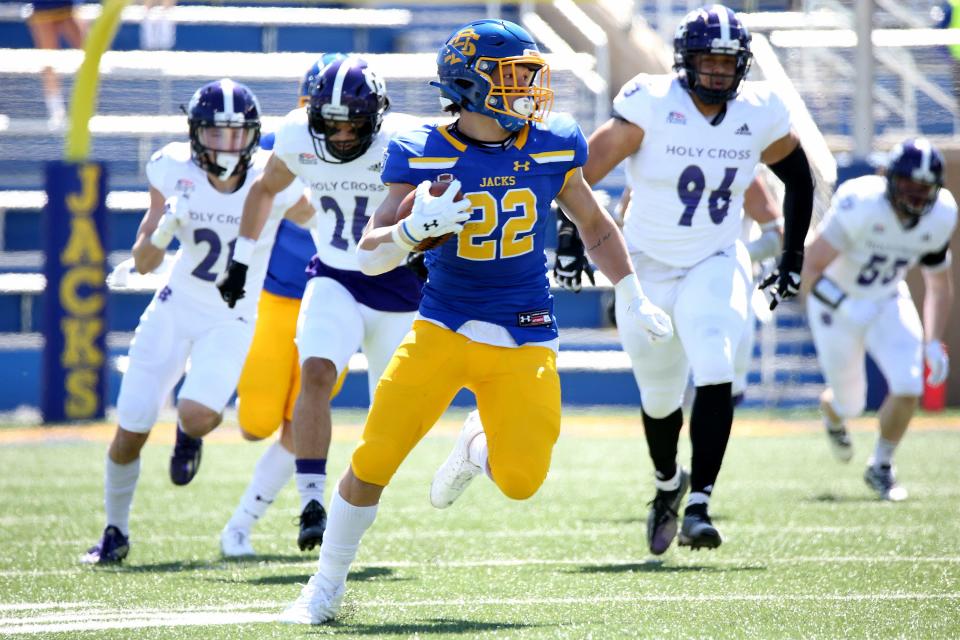 BROOKINGS, SD - APRIL 24: South Dakota State Jackrabbits running back Isaiah Davis #22 breaks loose for a big gain against the Holy Cross Crusaders at Dana J Dykhouse Stadium on April 24, 2021 in Brookings, South Dakota. (Photo by Dave Eggen/Inertia)