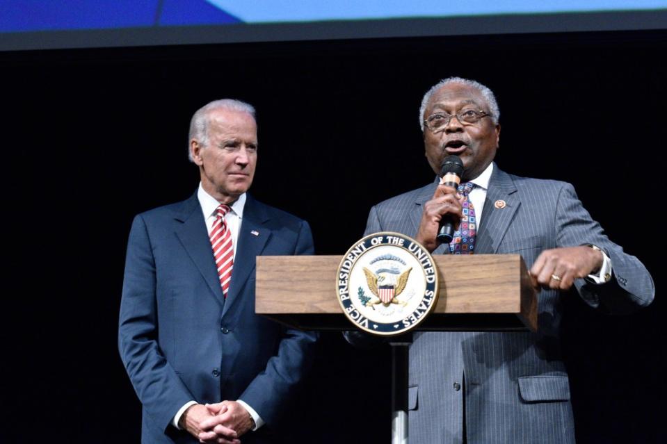 (Left to right) Vice President Joe Biden is introduced by U.S. Representative James Clyburn at the CBC Spouses 17th Annual Celebration of Leadership in the Fine Arts at the Nuseum Museum on Sept. 24, 2014, in Washington, D.C. (Photo by Earl Gibson III/Getty Images)