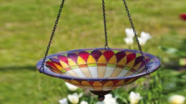 This hanging glass bird bath is a perfect gift for gardeners.