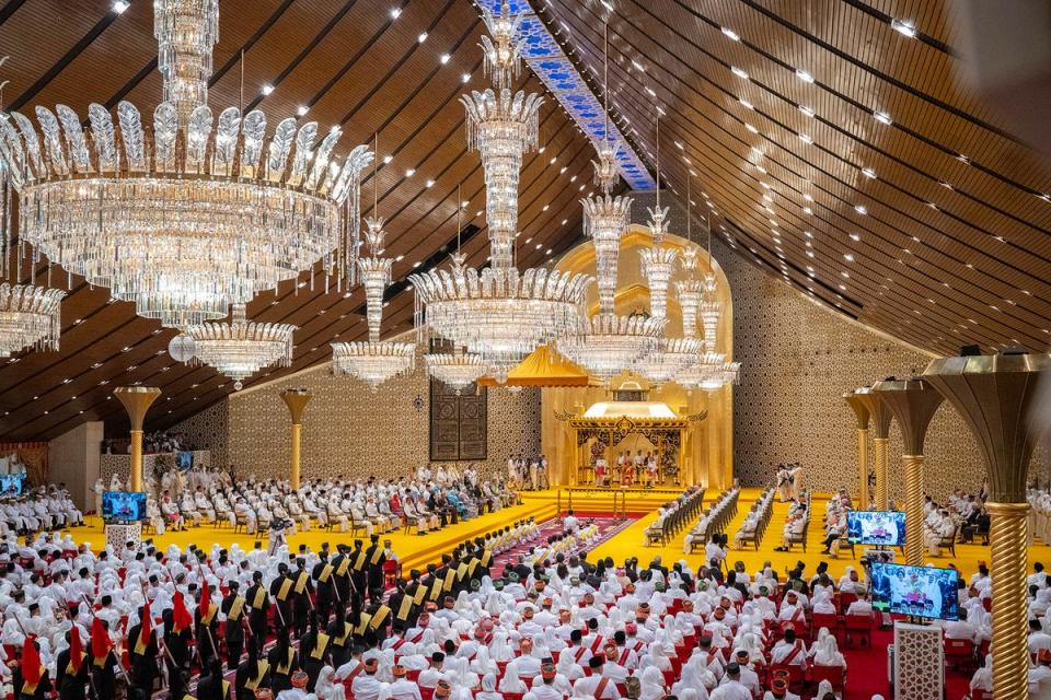 This picture taken by Brunei's Information Department on 10 January 2024 shows the royal powdering ceremony for Brunei's Prince Abdul Mateen's, center, at Istana Nurul Iman, ahead of his wedding with Anisha Rosnah, in Bandar Seri Begawan, Brunei (AP)