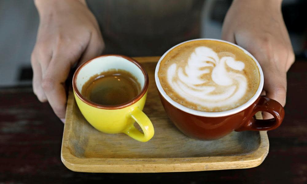 Coffee serving style called “Duet”, a cup of cappucino and a shot of espresso is pictured at Magnum Opus coffee shop in Paranaque, Metro Manila, Philippines May 5, 2017. REUTERS/Erik De Castro