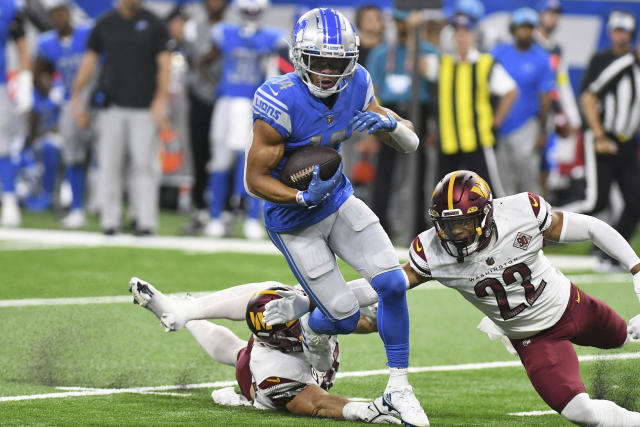 Detroit Lions wide receiver Amon-Ra St. Brown (14) runs a route against the  Miami Dolphins during an NFL football game, Sunday, Oct. 30, 2022, in  Detroit. (AP Photo/Rick Osentoski Stock Photo - Alamy