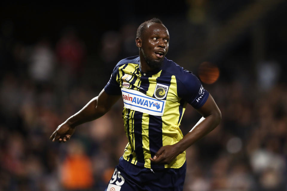 Seen here, Usain Bolt celebrates scoring his first goal for the Central Coast Mariners during a pre-season friendly against Macarthur South West United. 