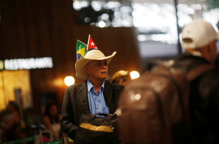 A Cuban doctor returns to his home, after criticism by Brazil's President-elect Jair Bolsonaro towards Cuban doctors prompted Cuba's government to sever a cooperation agreement, in Brasilia, Brazil November 22, 2018. REUTERS/Adriano Machado