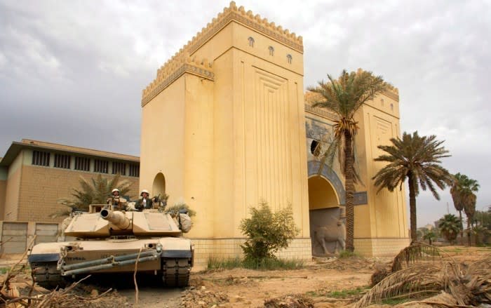 A U.S. tank positioned outside the Iraq Museum in April 2003 (Gleb Garanich / Reuters)