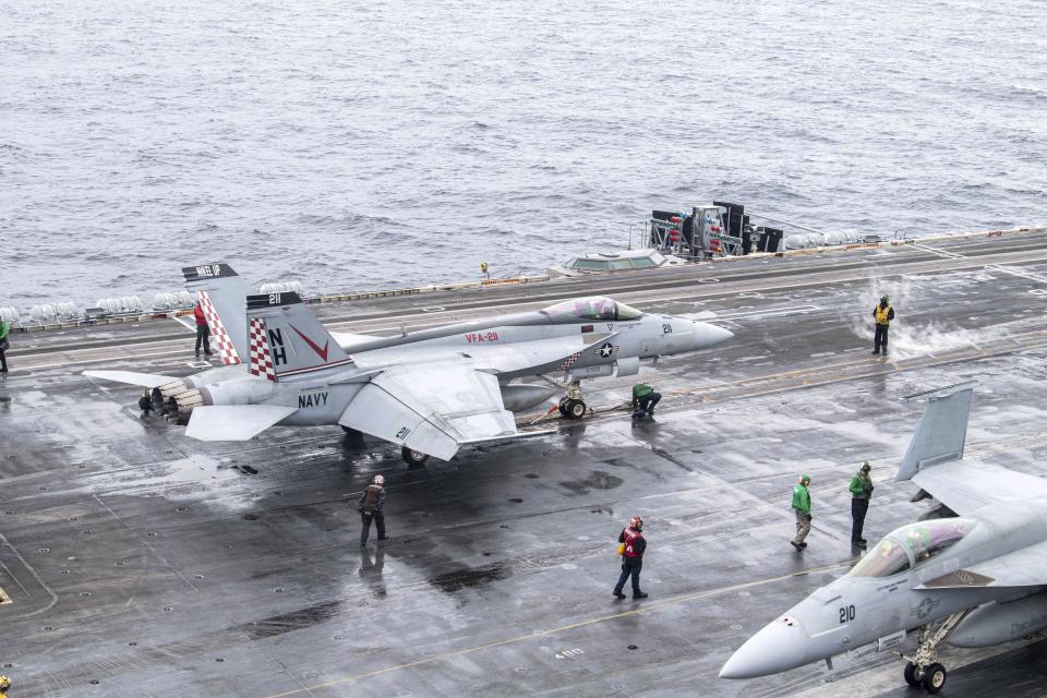 In this photo provided by the U.S. Navy, a U.S. fighter jet prepares to take off from USS Theodore Roosevelt aircraft carrier during the Freedom Edge exercise by the U.S., Japanese and South Korea at East Sea on Friday, June 28, 2024. (Mass Communication Specialist 2nd Class Rashan Jefferson/The U.S. Navy via AP)