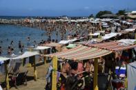 Crowds on Bahia de los Ninos beach in La Guaira, Vargas state